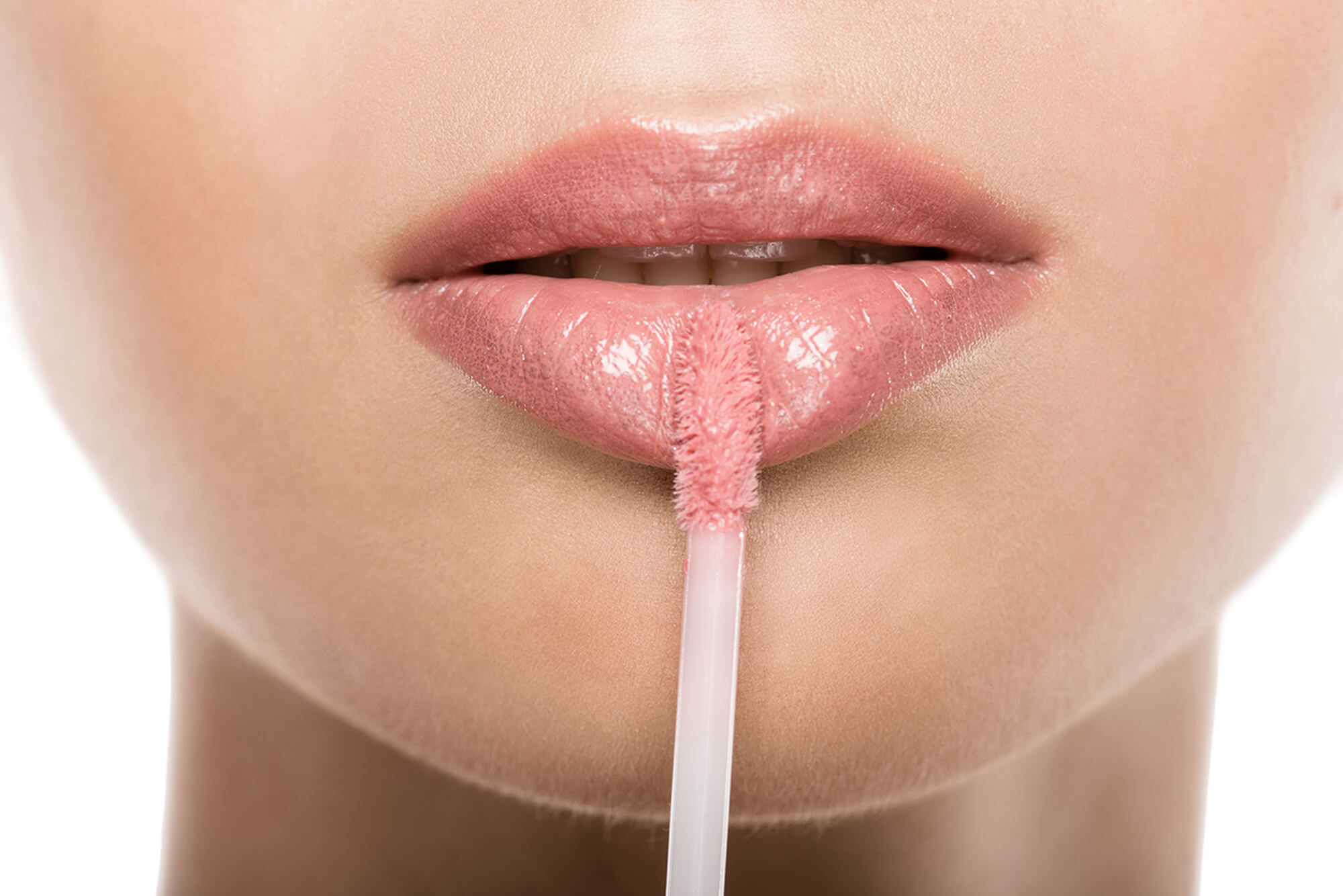 close-up-view-of-beautiful-woman-applying-pink-lip-2023-11-27-05-28-22-utc